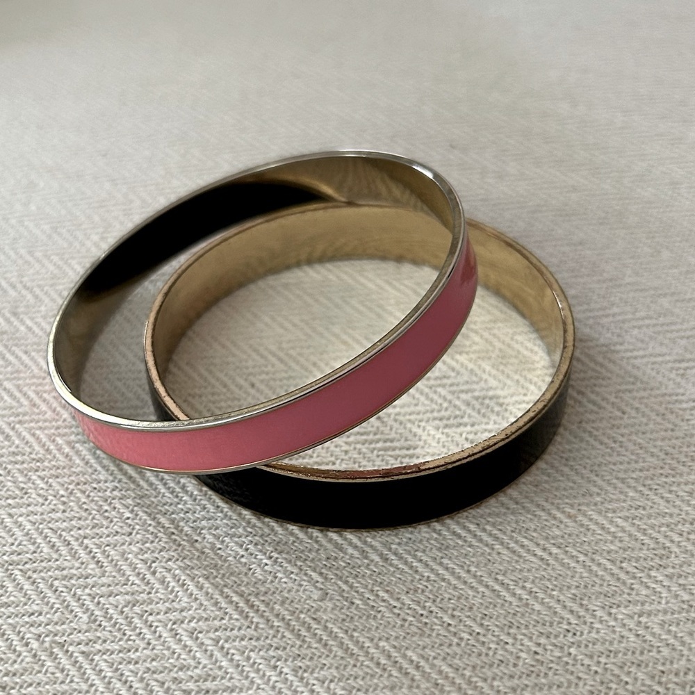 Pair of pink and black enamel bangle style bracelets